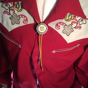 Bolo tie featuring Coast Guard medallion coin